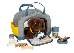 Labrador-Hund mit Tasche und Pflege-Set