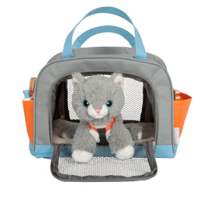 Katze mit Tasche und Pflege-Set