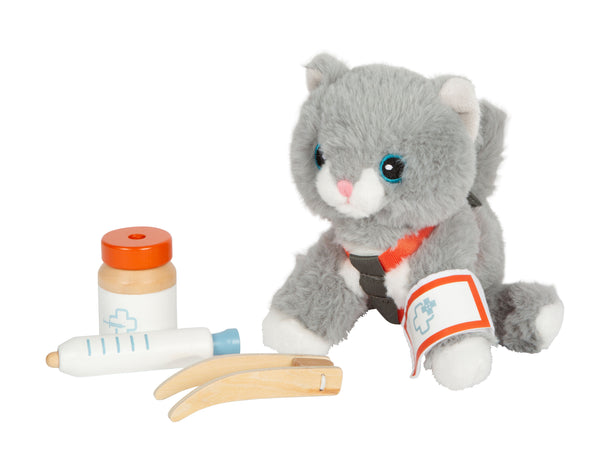 Katze mit Tasche und Pflege-Set