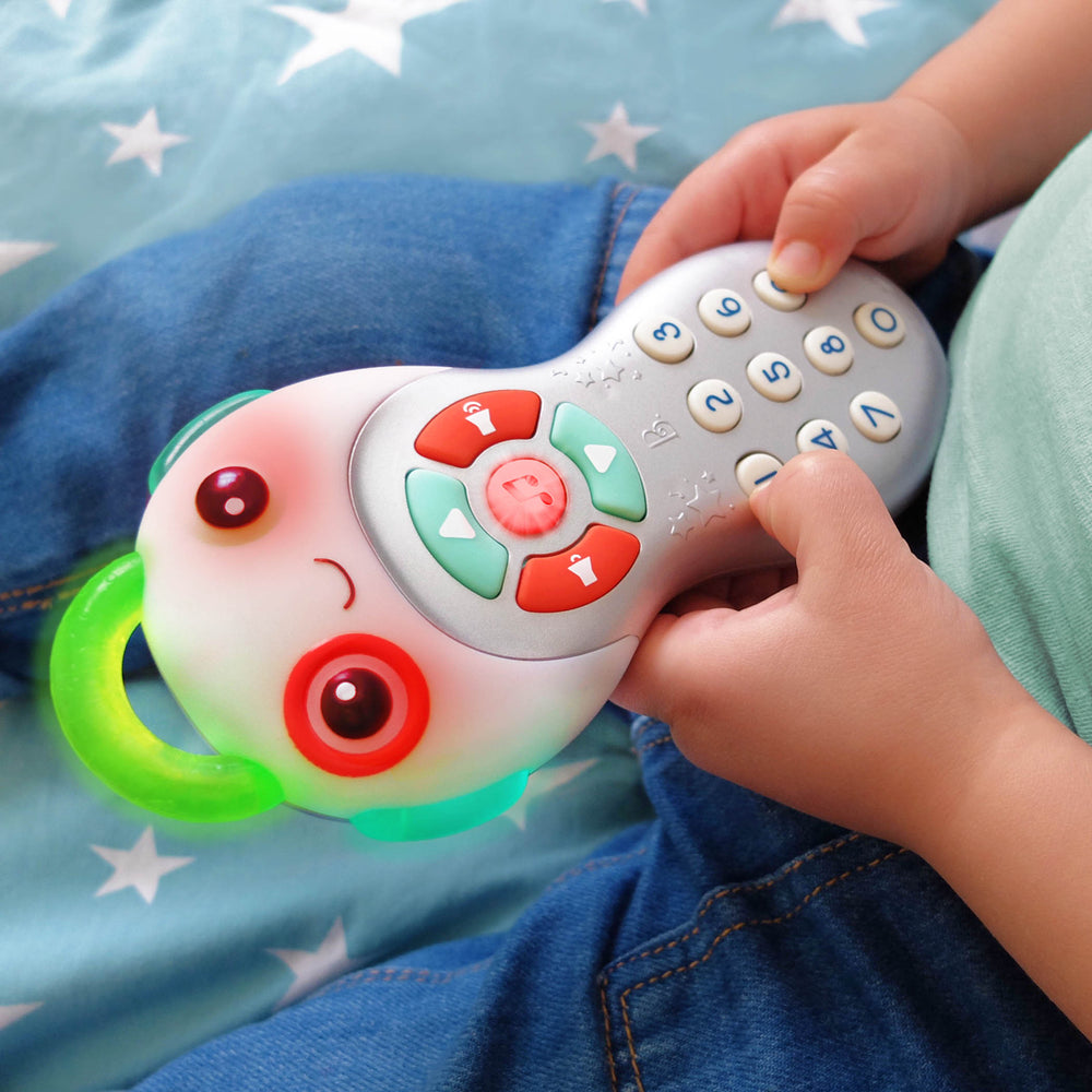 B. toys musikalische Baby-Fernbedienung Grab n' Zap