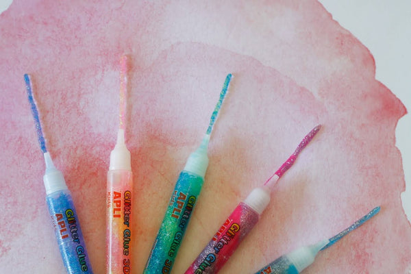 Dekorativer Glitzerkleber – 5 fluoreszierende Farben - Tublu.de