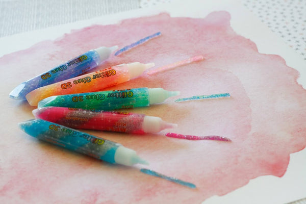 Dekorativer Glitzerkleber – 5 fluoreszierende Farben - Tublu.de