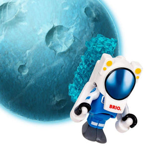 Astronaut im Raumanzug sammelt Mineralien vor einem Planeten