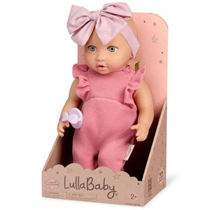 Baby-Puppe mit Schnuller, im Strampler und mit Stirnband
