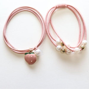 Yuko B. Haargummi-Armbänder Pfirsich - 2 Stück - Ansicht 2