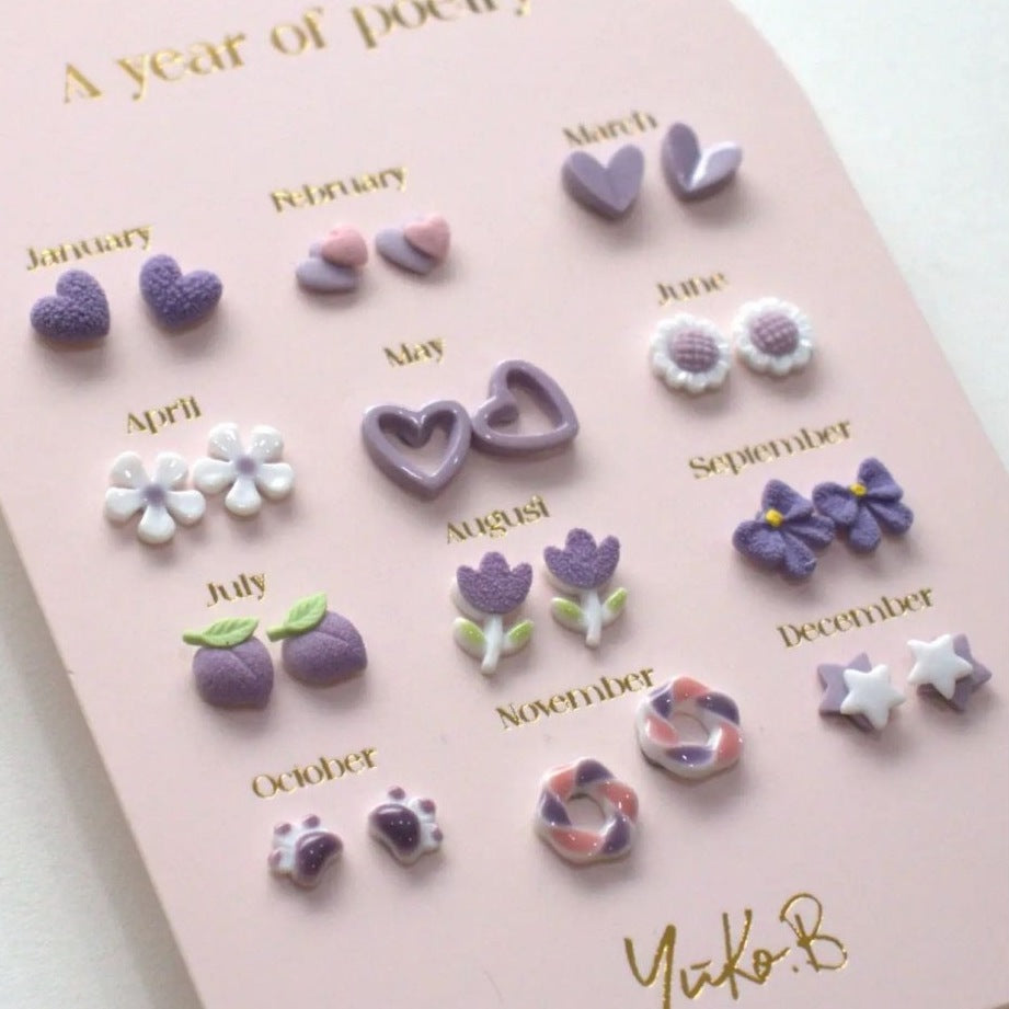 Yuko B. Ohrstecker-Set Poesie-Jahr Lila mit 12 Paar