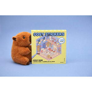 Cosy Stickers Lovely Home Verpackung neben einem Plüschtier