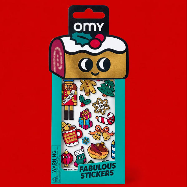 Verpackung der Vinyl-Sticker Iconic Christmas von OMY auf rotem Hintergrund