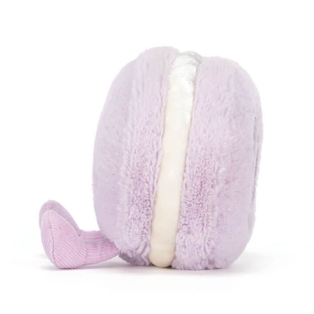 Jellycat Amüsanter Macaron Mai Kuschelpuppe in lila mit fröhlichem Gesicht und kleinen Beinen