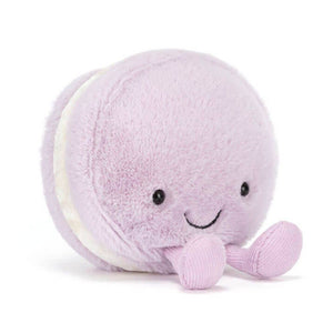Jellycat Amüsanter Macaron Mai Kuschelpuppe in lila mit fröhlichem Gesicht und kleinen Beinen
