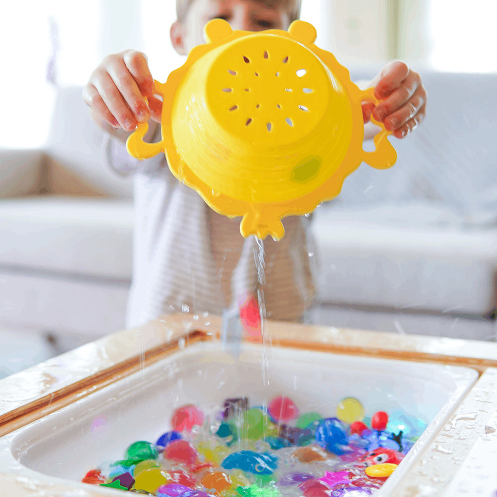 Glo Pals 5-in-1-Spielzeugset zur Förderung der Feinmotorik mit buntem Badewannenspielzeug in Gelb und Lila
