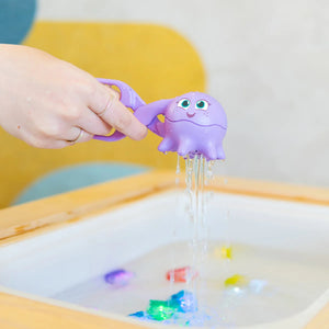 Glo Pals 5-in-1-Spielzeugset zur Förderung der Feinmotorik mit lila Oktopus-Bade-Spielzeug und Wasserspritzfunktion