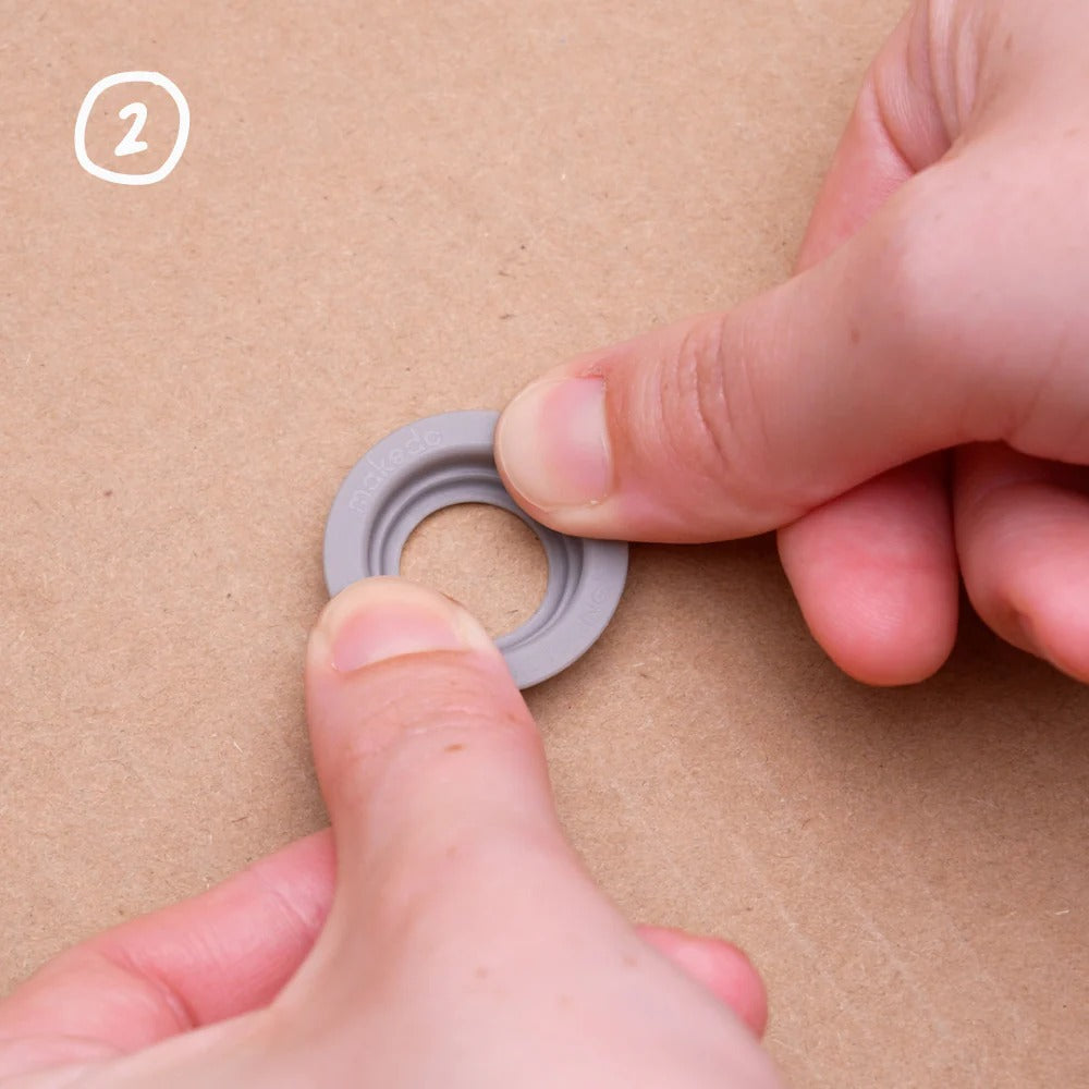 Satz von Roto-Ring 16 el. von Makedo mit grauen Kunststoffringen und Verpackung