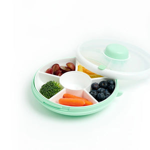 Gobe Snack Spinner Snackbehälter - Mint Green mit fünf Fächern gefüllt mit Obst und Gemüse