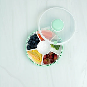 Gobe Snack Spinner Snackbehälter - Mint Green mit verschiedenen gesunden Snacks in Fächern