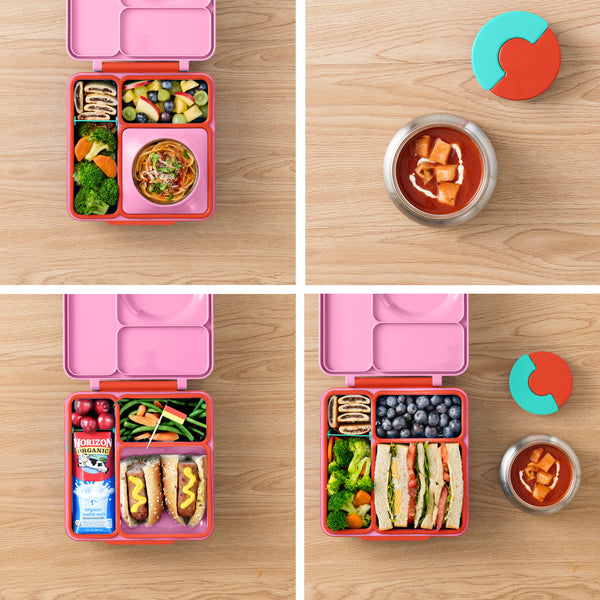 Lunchbox mit Thermoskanne OmieBox – Pink Berry gefüllt mit gesunder Mahlzeit und Thermoskanne auf Holzuntergrund