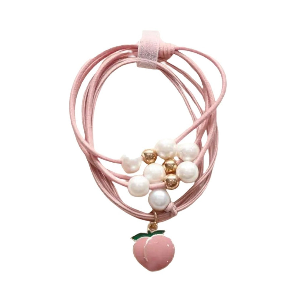Yuko B. Haargummi-Armbänder Pfirsich - 2 Stück - Produktbild
