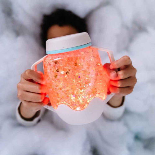 Glo Pals Zabawka progresywna mit Sensorik-Glas zum Befüllen mit Wasser – grau und leuchtenden Sternen