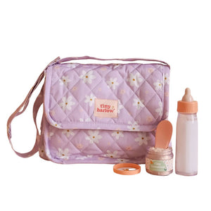 Lila Tasche mit Zubehör für Puppen von Tiny Harlow mit Flasche und Pflegeprodukten