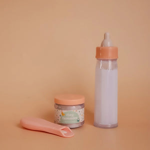 Tiny Tummies Set Babyspielzeug mit Flasche, Schnuller und Gläschen für Puppenliebhaber